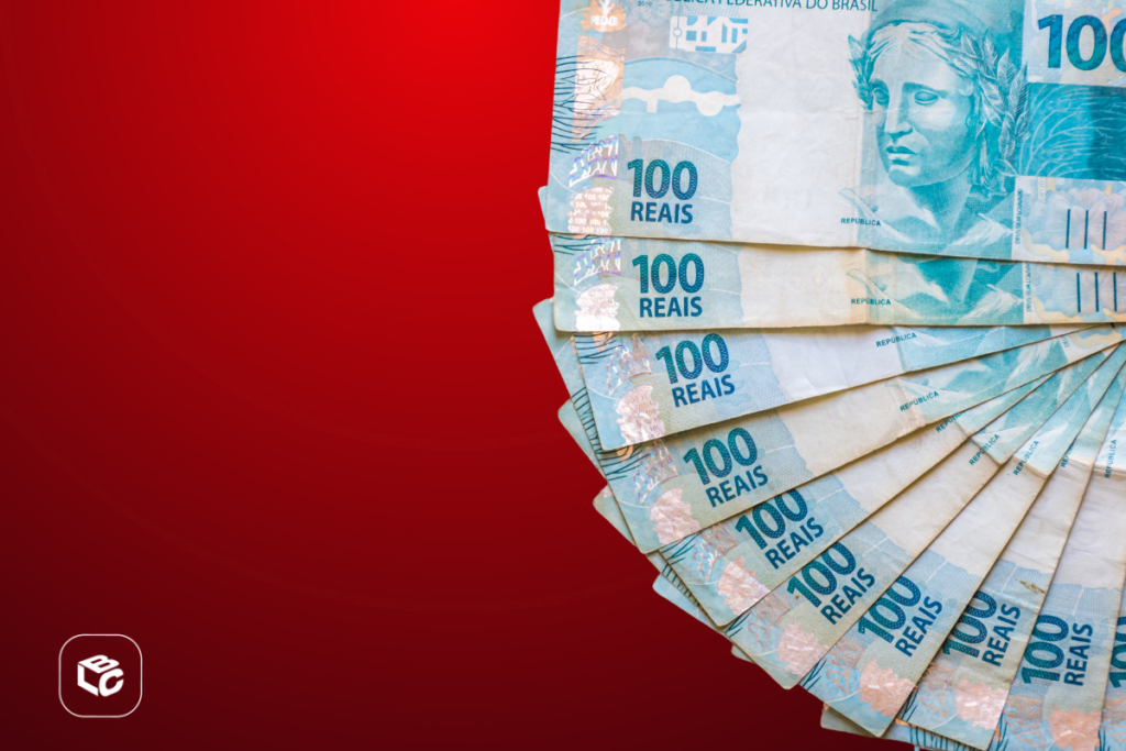 Cédulas de dinheiro brasileiro em formato circular sobre fundo vermelho, representando valores financeiros, pagamento e crédito judicial.